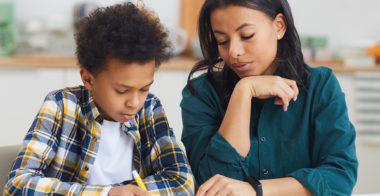 mom and child writing